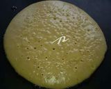 A picture of step 2 of Banana Tutty Fruity Pancakes.