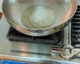 A picture of step 2 of Kacchi keri ka khatta metha aachar.