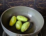 A picture of step 3 of Dudh Potol (Pointed gourd cooked in a milk gravy).