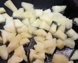 A picture of step 3 of Thai style fried rice with pineapple.