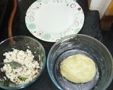 A picture of step 4 of Aloo kofta with paneer stuffing in golden gravy.