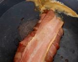 A picture of step 6 of Bacon Wrapped around Chicken breast with soft Smoked Cheese 🤩.