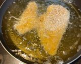 A picture of step 4 of Less saucy chicken Parmesan.