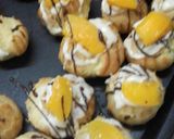 Foto del paso 6 de la receta: Bombita rellenas con crema y dulce