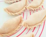 A picture of step 9 of Flaky Spiral Curry Puffs.
