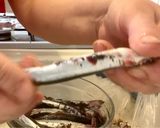 A picture of step 2 of Microwave Marinated Anchovies with Olive Oil, Lemon, Salt, and Pepper.