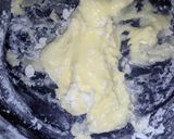 A picture of step 8 of Vanilla cream filled doughnuts.