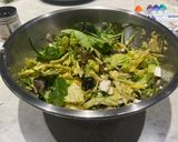 A picture of step 2 of Savoy cabbage and green leaves salad with tasty dressing.