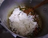 A picture of step 8 of Spicy tumeric rice with chicken strips.