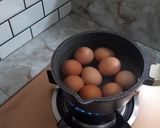 Foto langkah ke 1 dari resep Gulai Telur Tahu dan Kacang Panjang.