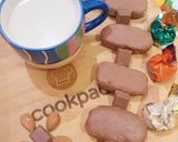 A picture of step 11 of Chocolate bounties with cofee.
