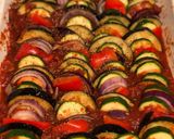 A picture of step 7 of Farm shop wild boar and venison sausages on ratatouille.