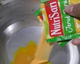 Foto langkah ke 4 dari resep 65. Puding Lapis Nutrisari Jeruk Peras.