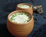 A picture of step 6 of Sitafal basundi.