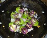 A picture of step 4 of Bharwa Masala baingan.