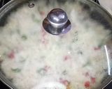 A picture of step 11 of Tender coconut and pomegranate cheesy pulao.