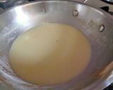 A picture of step 4 of Peas and makhana curry in white gravy.