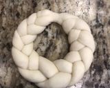 A picture of step 8 of Christmas wreath bread.