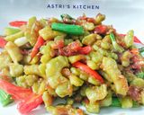 Foto langkah ke 6 dari resep Pare goreng bumbu kemiri.