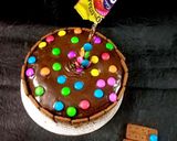 A picture of step 5 of Biscuit chocolate gems cake.