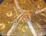 Foto del paso 5 de la receta: Arroz con manitas de conejo, cigalas, sepia y langostinos