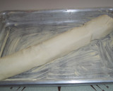 Foto del paso 8 de la receta: Tronco de hojaldre relleno de lomo adobado y queso