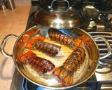 A picture of step 8 of Mike's New Orleans Lobster, Shrimp & Crab Meat Po Boys.