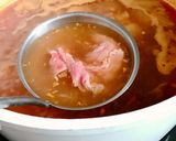 A picture of step 4 of Bún Bò Huế Tái Nạm.