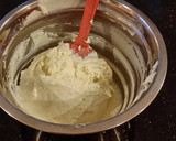 A picture of step 10 of Vanilla Lemon Raspberry Layer Cake with Whipped Cream Buttercream Frosting.