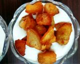 A picture of step 9 of Makhana moongfali raita and Crispy potatoes raita.