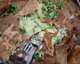 A picture of step 10 of Healthy loaded nachos.