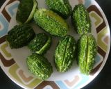 A picture of step 1 of Stuffed Karela/ Bittergourd.
