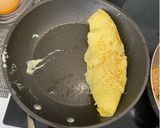 A picture of step 10 of Omurice (Japanese omelette rice).