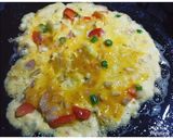 A picture of step 5 of Lachaydar Spicy Anda Paratha With Gajar Ka Halwa.