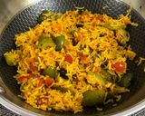A picture of step 12 of Capsicum Tomato Rice.
