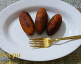 A picture of step 8 of Ranga Alur Puli / Shakarkand puli/Fried Sweet Potato Dumplings.