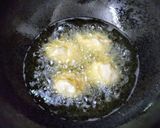 A picture of step 5 of Koat pitha.