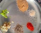 A picture of step 1 of Punjabi thali (chole with rice, creamy Palak paneer, spicy onion lachcha and refreshing lassi).