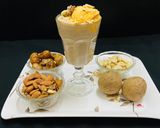 A picture of step 2 of Chikku &Dry fruit and nuts milkshake.