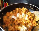 A picture of step 12 of Schezwan matar paneer corn masala.