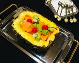 Foto del paso 3 de la receta: Ensalada Especial de Piña 🍍 Rellena con Frutas y Miel!🍯🥝🍊🍒