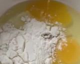 A picture of step 2 of Green Pudding with the hint of coconut powder and Pakola syrup.