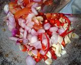 Foto langkah ke 6 dari resep Oseng daun dan bunga pepaya gantung.