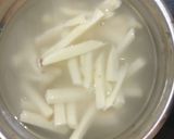 A picture of step 2 of Sweet,Savory Sweet Potato Fries.