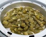 A picture of step 1 of Papdi Sabzi (Indian Broad Beans) Flat Green Beans.