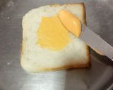 A picture of step 2 of Cheesy Scrambled Egg Sandwich With Black Tea.