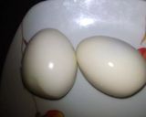 A picture of step 2 of Boiled egg cut snowman.