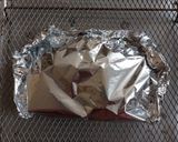Foto del paso 3 de la receta: Pescado empapelado con brócoli y zanahoria en freidora de aire
