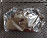 Foto del paso 3 de la receta: Pescado empapelado con brócoli y zanahoria en freidora de aire