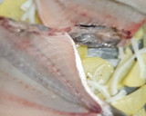 Foto del paso 3 de la receta: Dorada al horno con patata panadera